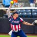 Softball player pitches