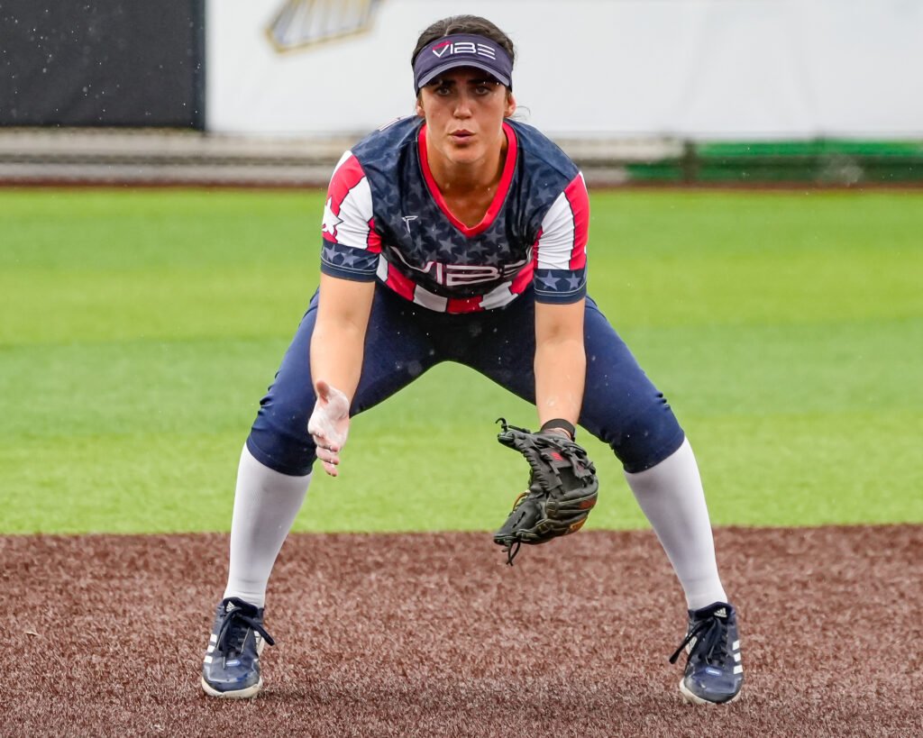 Softball player Grayson Radcliffe in a red, white, and blue uniform.