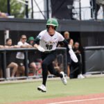 Talons player running from third.