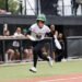Talons player running from third.