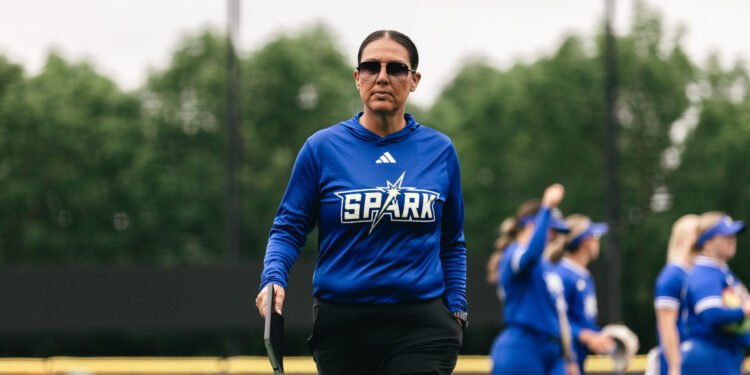 Spark head coach Amber Flores